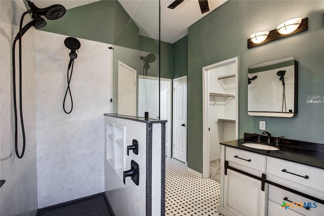 bathroom with vanity and walk in shower