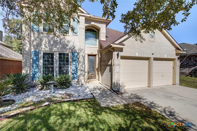 view of front of property with a garage