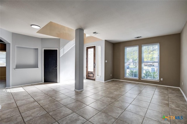 view of tiled spare room