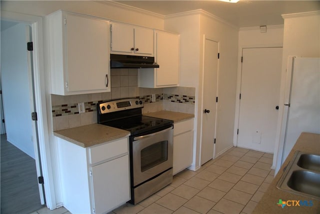 kitchen featuring white cabinetry, sink, backsplash, stainless steel range with electric stovetop, and ornamental molding