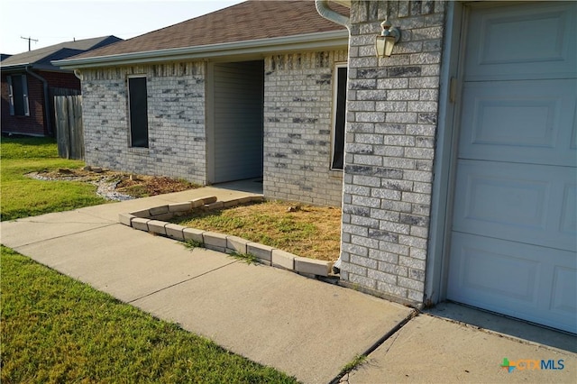 entrance to property featuring a garage