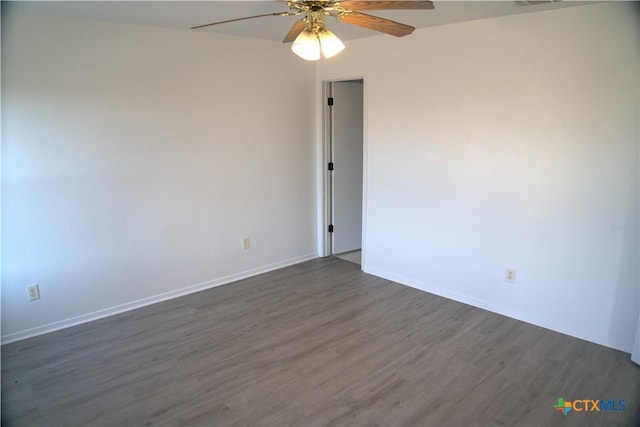 unfurnished room featuring dark hardwood / wood-style flooring and ceiling fan