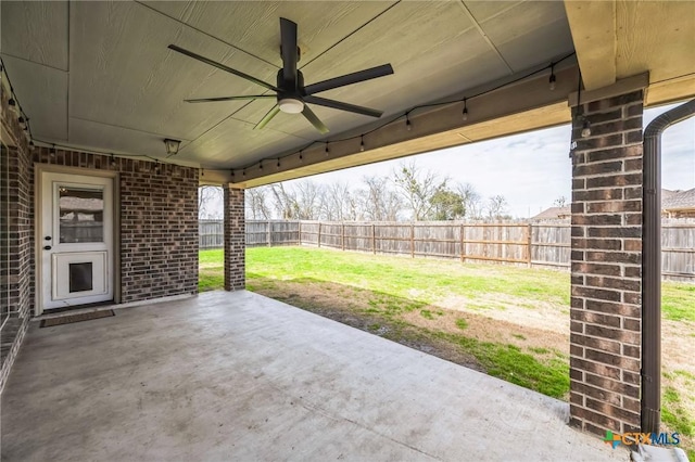 view of patio / terrace featuring ceiling fan and a fenced backyard