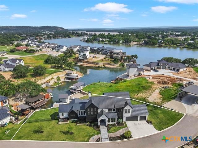 aerial view featuring a water view