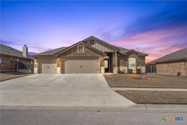 craftsman inspired home with a garage