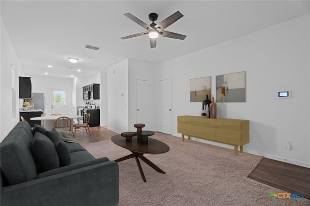 5806 Gulf Mdw, Converse, TX 78109 - carpeted living room with a ceiling fan and recessed lighting