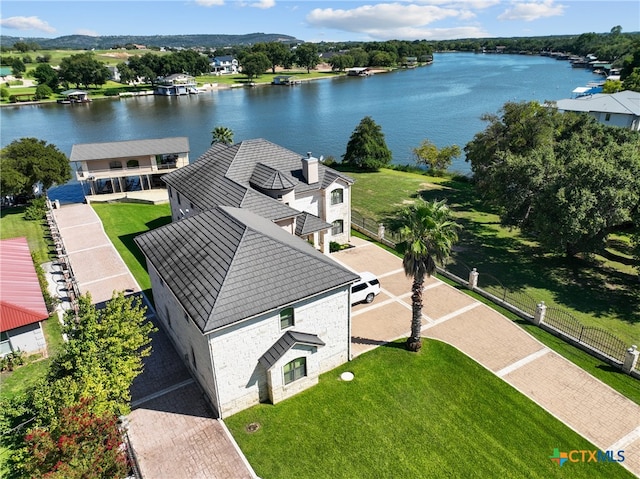 drone / aerial view with a water view