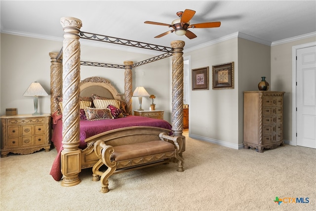 bedroom with carpet floors, ceiling fan, and crown molding