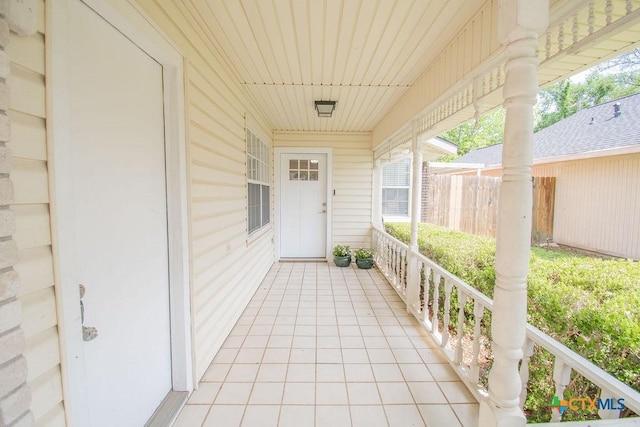 property entrance featuring covered porch