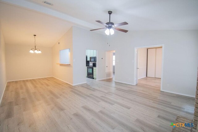 unfurnished living room with visible vents, baseboards, ceiling fan with notable chandelier, and light wood-type flooring
