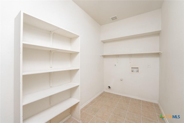washroom featuring laundry area, visible vents, gas dryer hookup, electric dryer hookup, and washer hookup