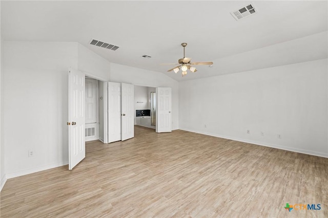unfurnished living room featuring visible vents, light wood finished floors, and a ceiling fan