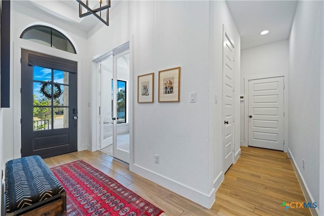 385 Althea, New Braunfels, TX 78132 - entrance foyer with light wood-style floors, baseboards, and recessed lighting