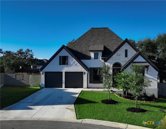 385 Althea, New Braunfels, TX 78132 - french country home with driveway, an attached garage, and roof with shingles