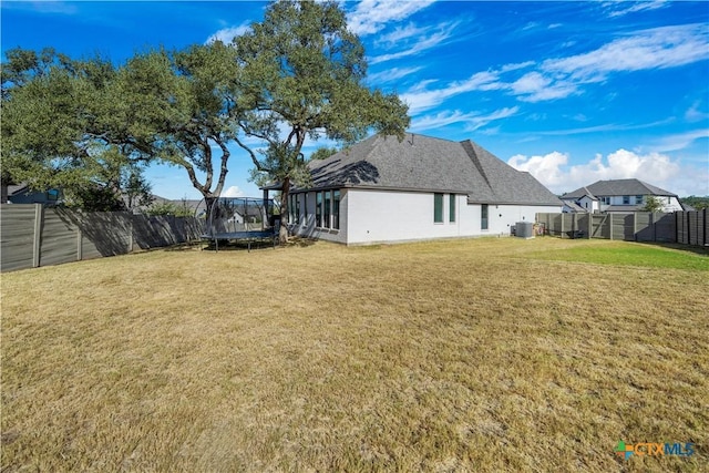 385 Althea, New Braunfels, TX 78132 - back of property with a trampoline and cooling unit