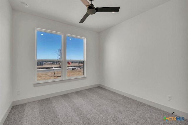 unfurnished room featuring carpet flooring and ceiling fan