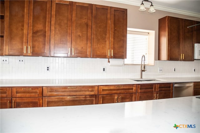 kitchen featuring light countertops, dishwasher, a sink, and white microwave