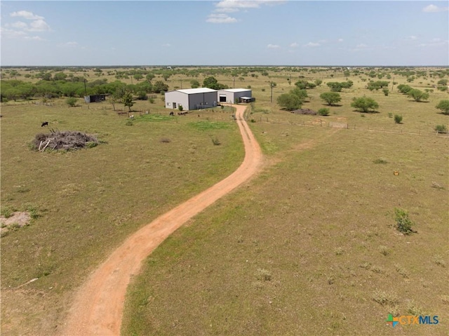 birds eye view of property featuring a rural view