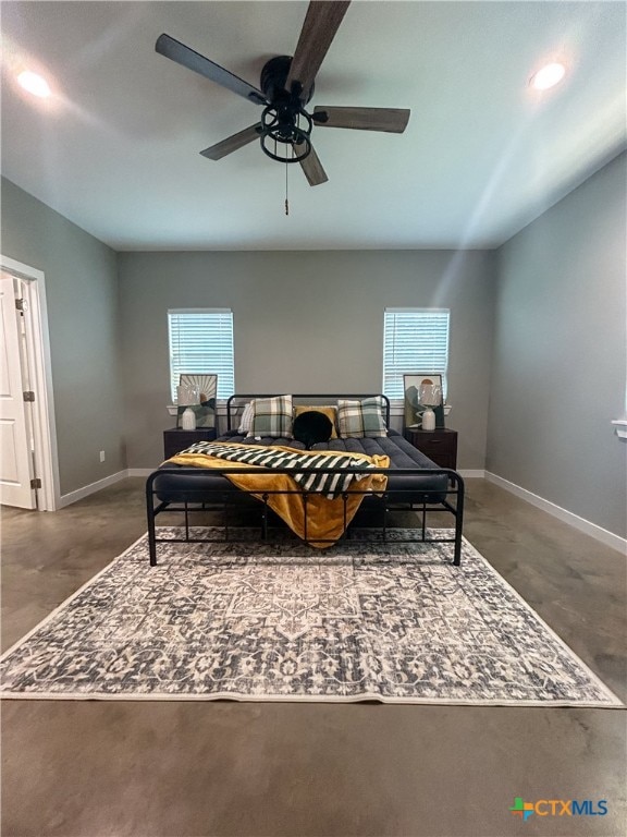 bedroom with concrete floors and ceiling fan