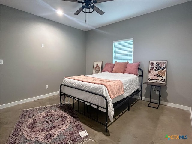 3306 Cypress, Victoria, TX 77901 - bedroom featuring concrete floors and a ceiling fan
