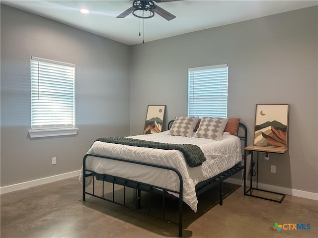 3306 Cypress, Victoria, TX 77901 - bedroom with concrete flooring and a ceiling fan