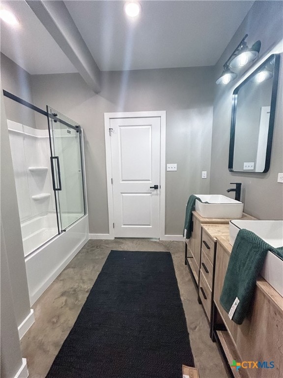 bathroom with enclosed tub / shower combo and vanity