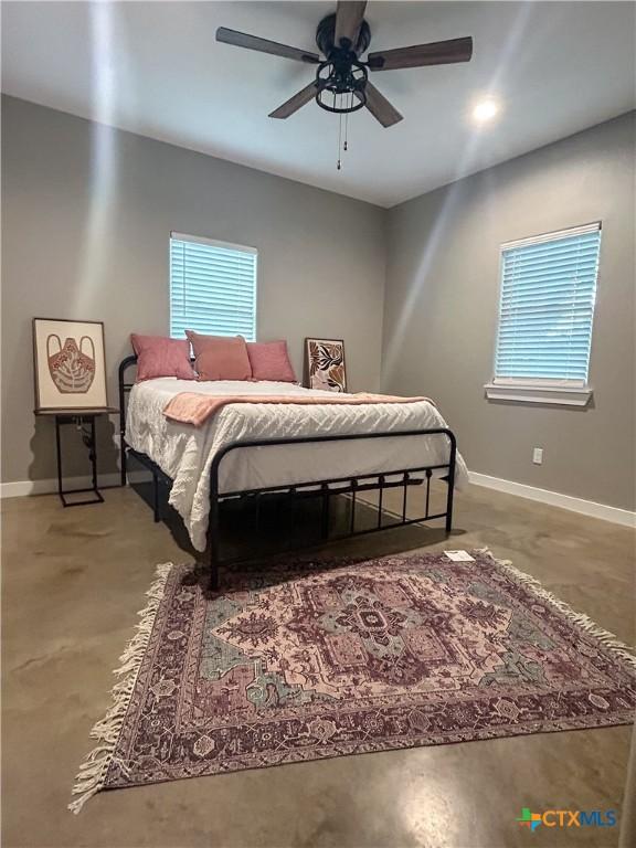 3306 Cypress, Victoria, TX 77901 - bedroom with baseboards and a ceiling fan