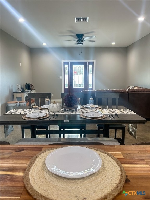 dining space with ceiling fan