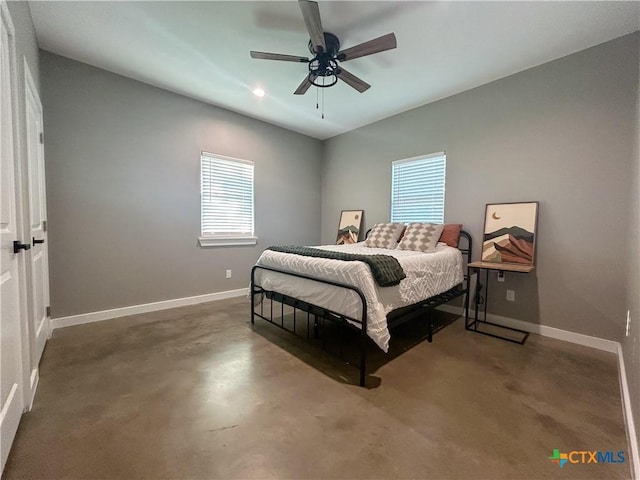 3306 Cypress, Victoria, TX 77901 - bedroom featuring multiple windows, concrete floors, and a ceiling fan