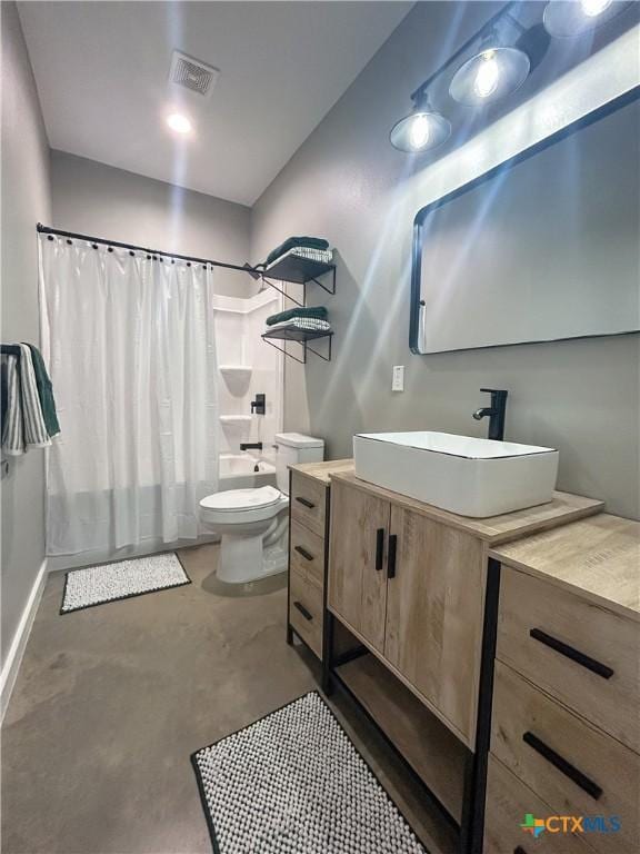 3306 Cypress, Victoria, TX 77901 - full bath with shower / bath combo with shower curtain, vanity, and finished concrete flooring