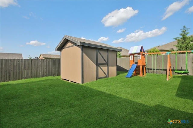 5106 La Piedra Ln, Killeen, TX 76549 - view of shed featuring a fenced backyard and a playground