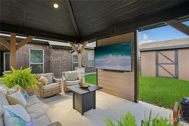 5106 La Piedra Ln, Killeen, TX 76549 - view of patio with an outdoor living space and an outbuilding