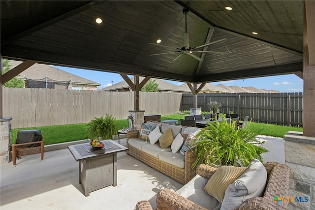 5106 La Piedra Ln, Killeen, TX 76549 - fenced backyard with outdoor lounge area, a ceiling fan, a patio, and a gazebo