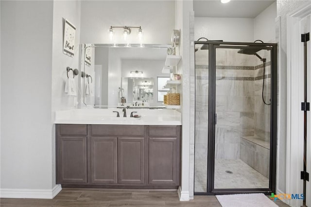 5106 La Piedra Ln, Killeen, TX 76549 - bathroom featuring a shower stall, vanity, and wood finished floors