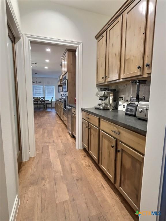 hall featuring light hardwood / wood-style floors