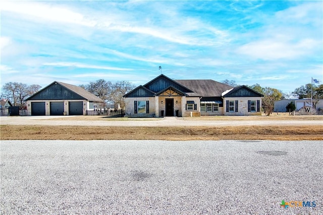 ranch-style home featuring a garage