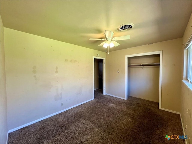 unfurnished bedroom featuring a closet, visible vents, carpet flooring, and baseboards