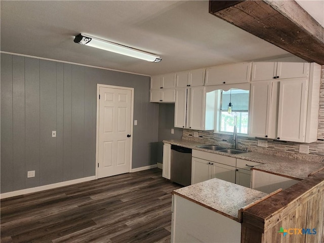 325 Montgomery St, Yoakum, TX 77995 - kitchen with dishwasher, white cabinetry, and dark wood-style flooring