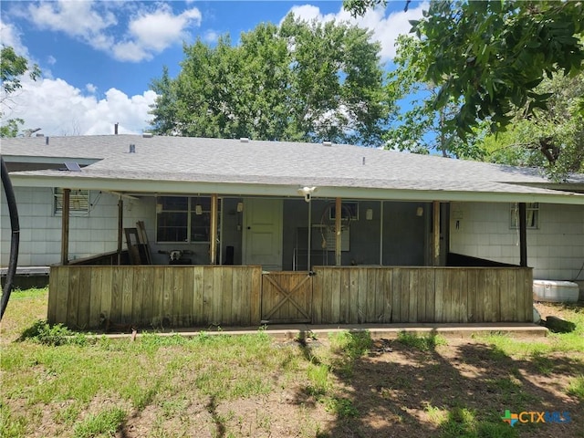 325 Montgomery St, Yoakum, TX 77995 - back of house with a shingled roof