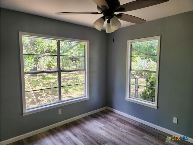 325 Montgomery St, Yoakum, TX 77995 - unfurnished room with a ceiling fan and wood finished floors