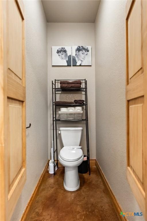 bathroom featuring toilet