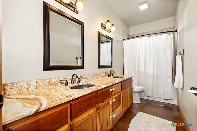 full bathroom with shower / bath combo, vanity, and toilet