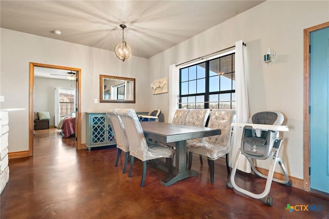 dining area featuring ceiling fan