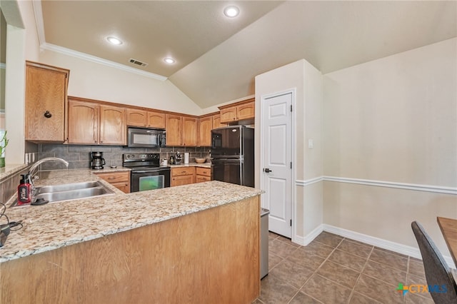 1921 Merlin Dr, Harker Heights, TX 76548 - kitchen with black appliances, a sink, a peninsula, tasteful backsplash, and baseboards