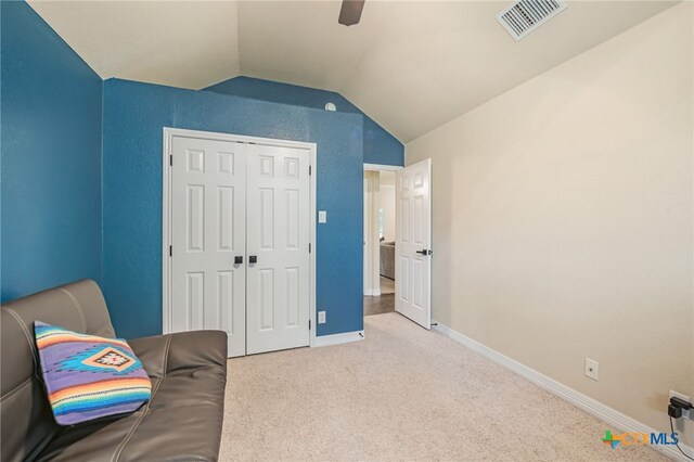 1921 Merlin Dr, Harker Heights, TX 76548 - living area with vaulted ceiling, a ceiling fan, carpet floors, and baseboards