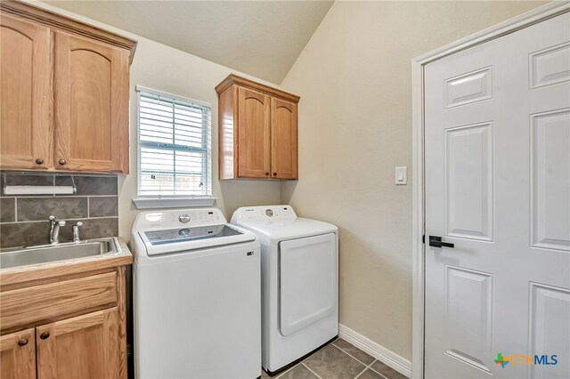 1921 Merlin Dr, Harker Heights, TX 76548 - laundry room featuring cabinet space, washer and clothes dryer, tile patterned flooring, and baseboards