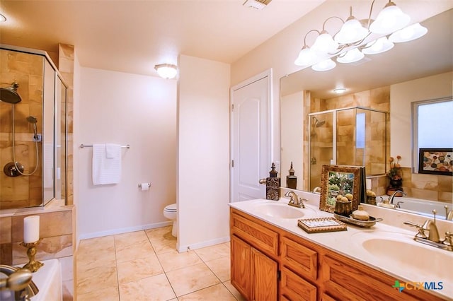 bathroom featuring a sink, a garden tub, and a stall shower