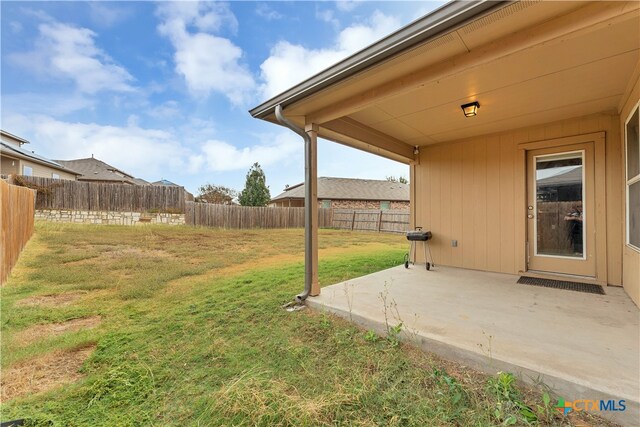 view of yard with a patio area