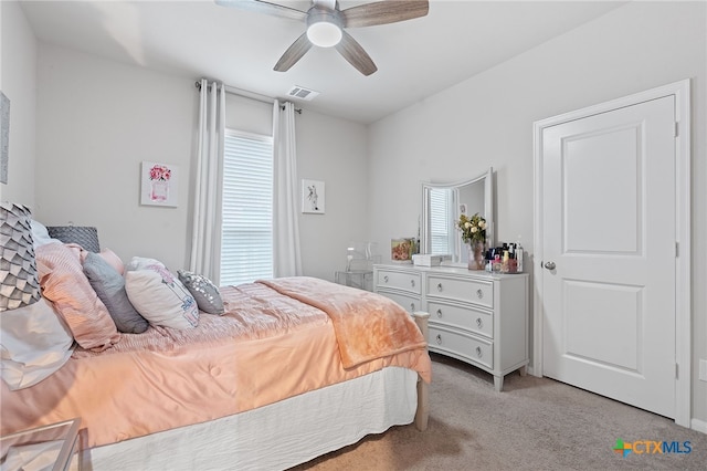 804 Blue Oak Blvd, San Marcos, TX 78666 - bedroom featuring light carpet and a ceiling fan