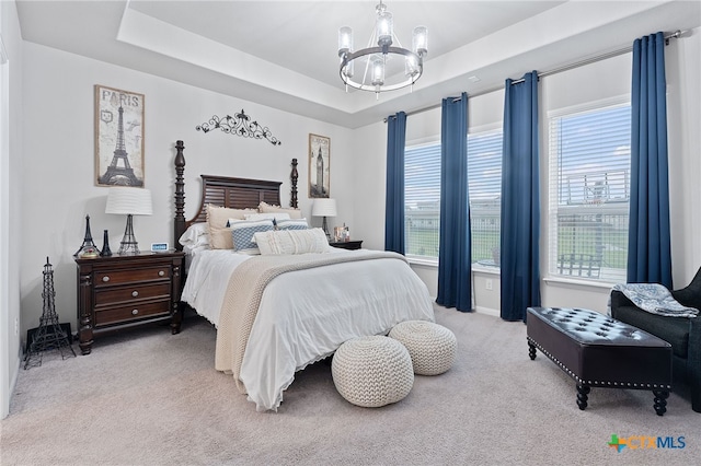 804 Blue Oak Blvd, San Marcos, TX 78666 - bedroom featuring a chandelier, carpet, and multiple windows